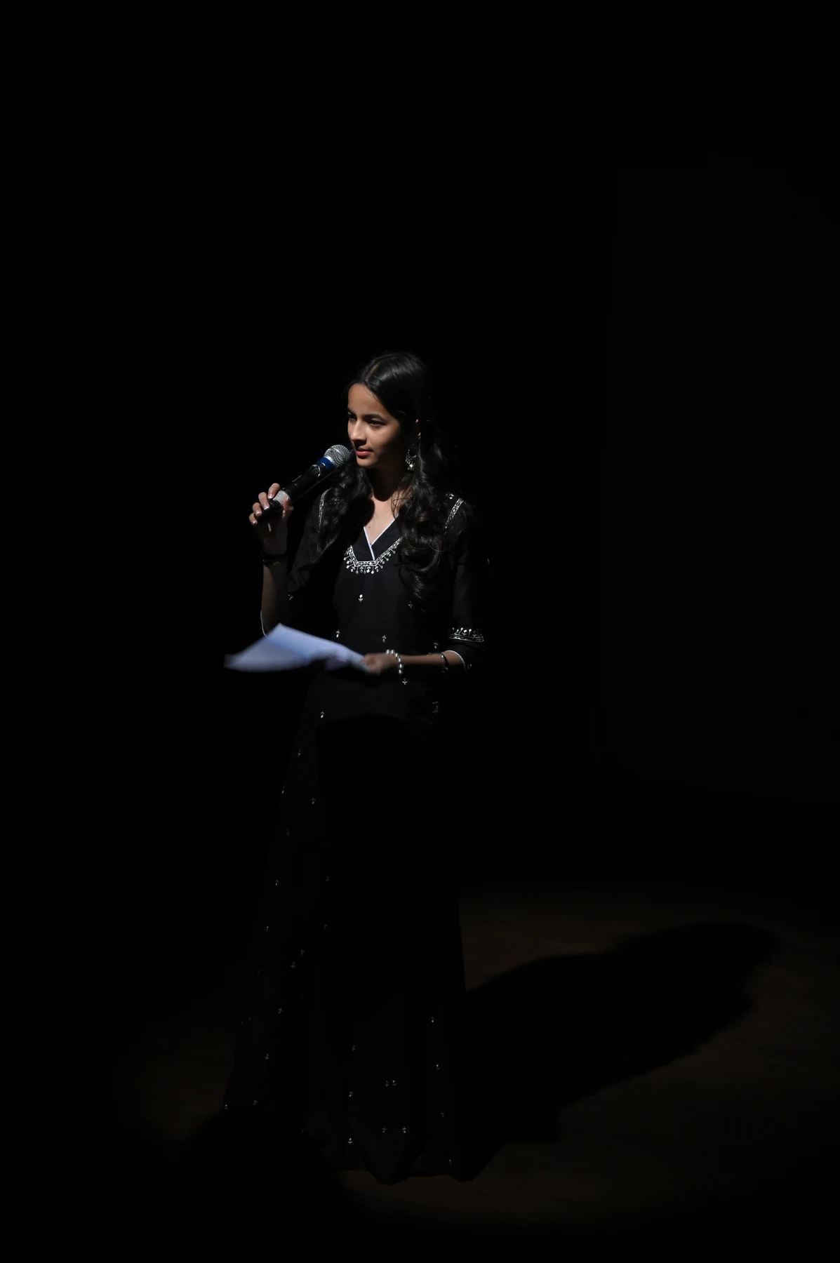 Aanya Jain speaking on stage at Project Junoon